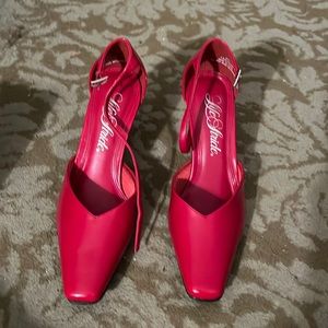 Brand new. Never worn.  Life stride pumps with ankle strap. Size 8.